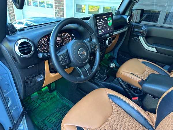 Used-2014-Jeep-Wrangler-Unlimited-Sahara