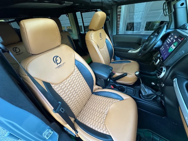 Used-2014-Jeep-Wrangler-Unlimited-Sahara